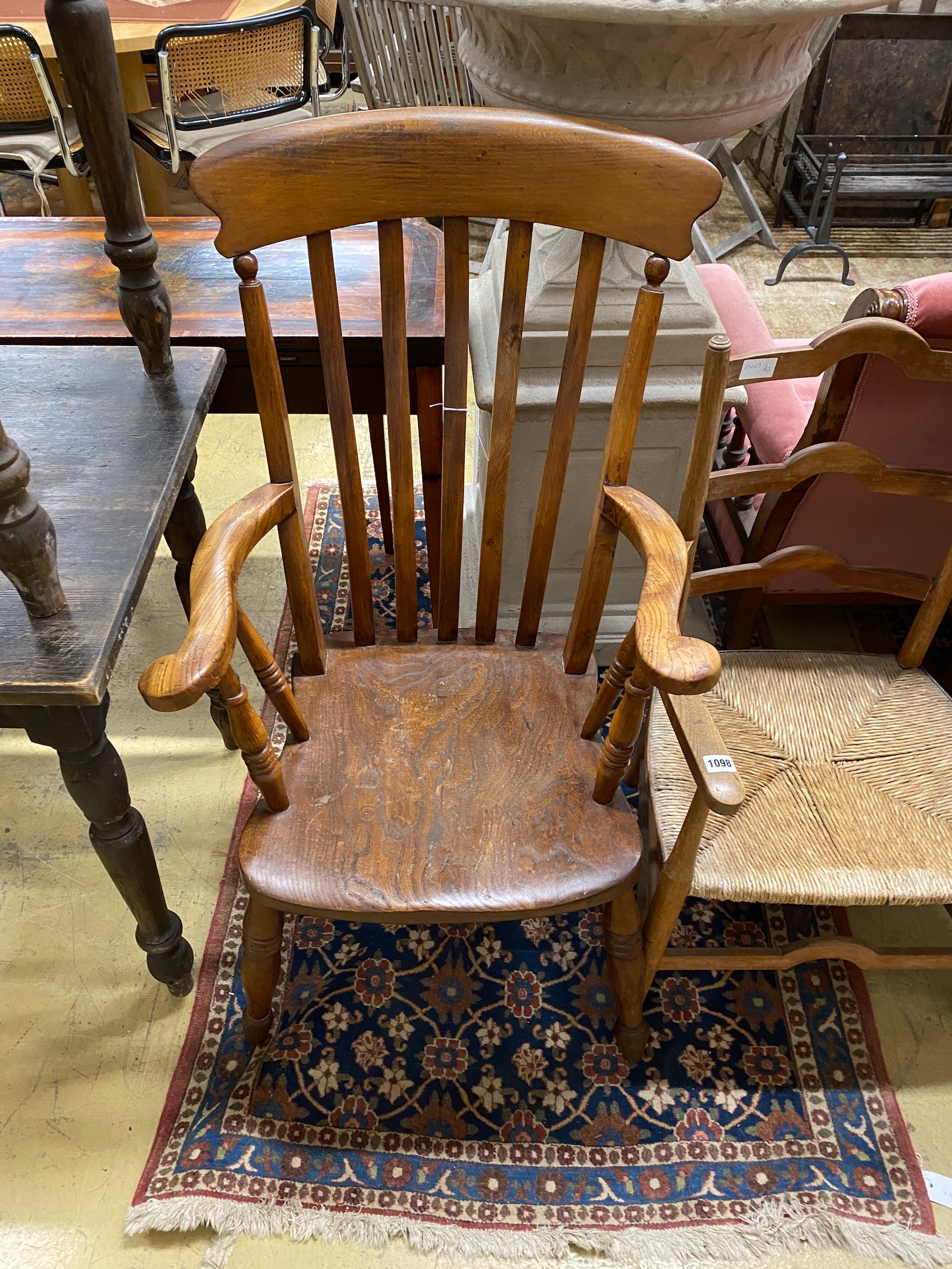 A Victorian elm and beech Windsor lathe back armchair, width 59cm, depth 49cm, height 108cm